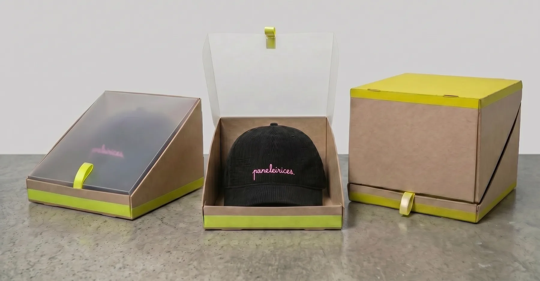 Three Paneleirices packaging formats: an open display box, a lid box with the cap inside, and a cube box